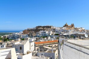 A densely packed urban area with historical architecture, including a prominent dome structure.