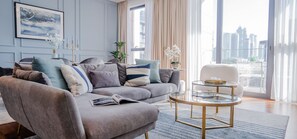 Premier Apartment, 2 Bedrooms | Living area | 55-inch Smart TV with cable channels, TV, Netflix
