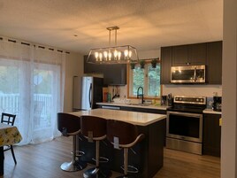 Four Bedrooms Apartment | Private kitchen | Full-size fridge, microwave, oven, stovetop