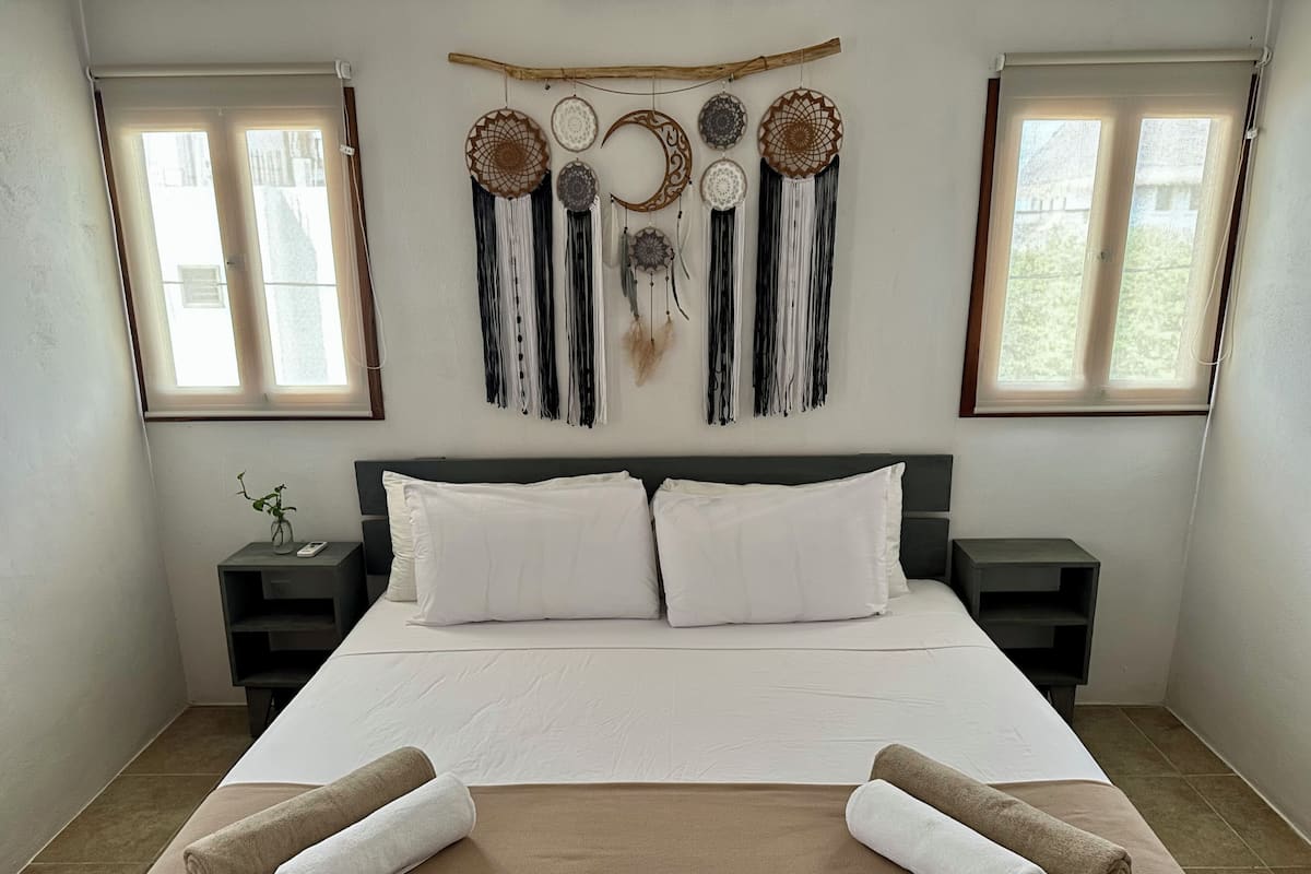Junior Suite, Kitchen, Pool View | 1 bedroom, iron/ironing board, free WiFi, bed sheets