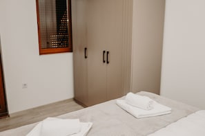 Premium bedding, down comforters, minibar, in-room safe