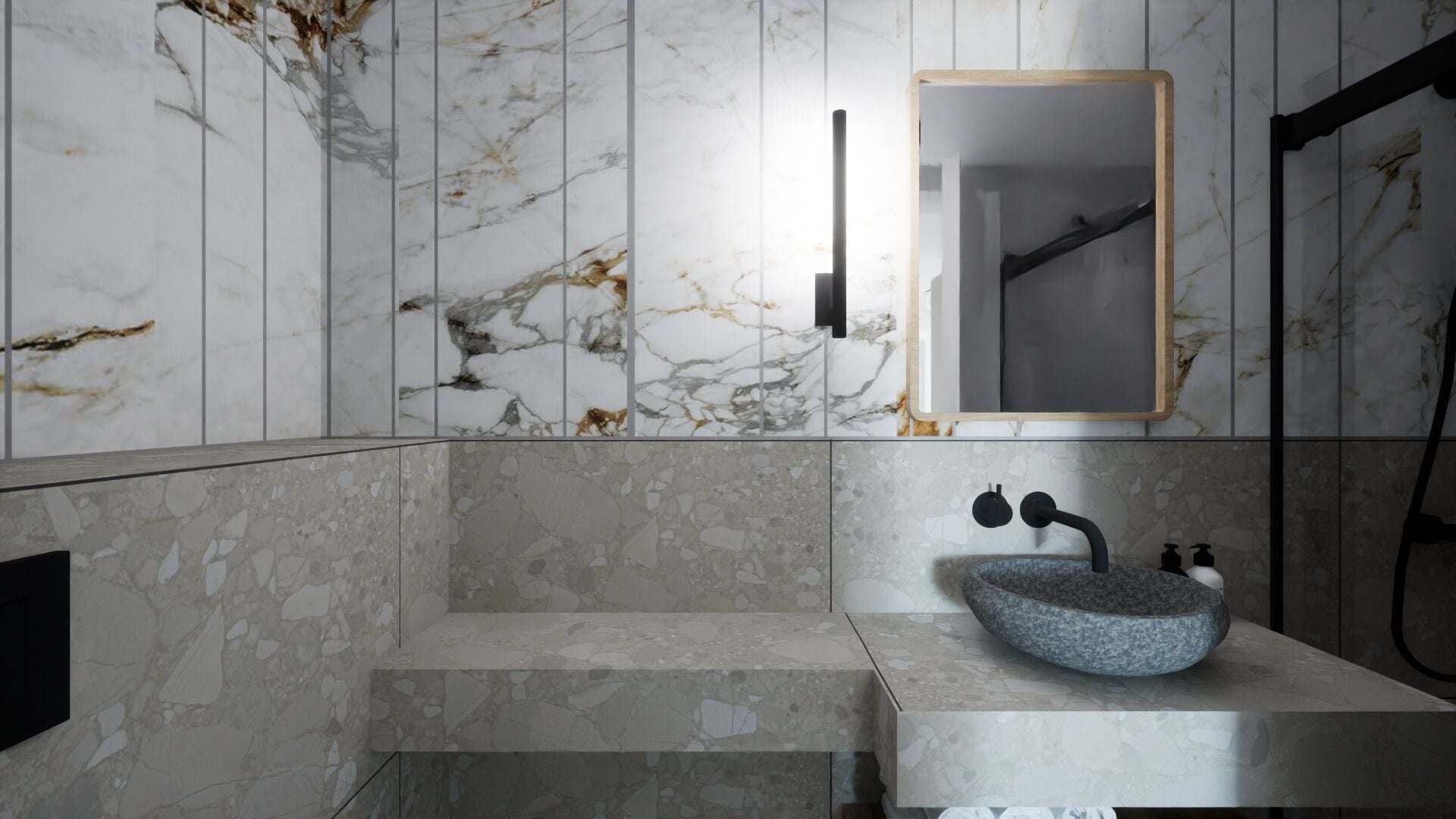 A modern bathroom with a marble wall, a built-in sink, and a mirror.