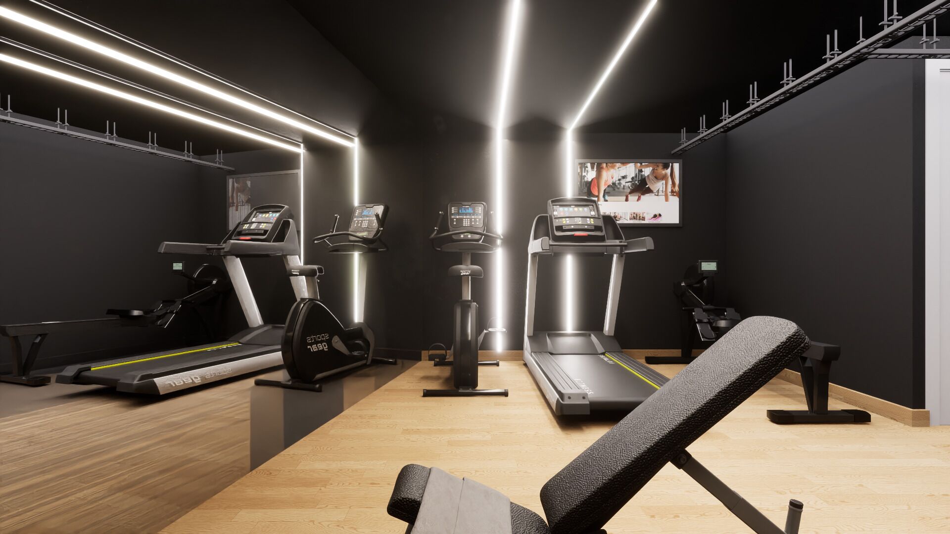 A modern gym with treadmills, elliptical machines, and a bench.