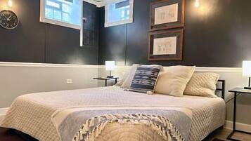 1 bedroom, desk, iron/ironing board, travel crib