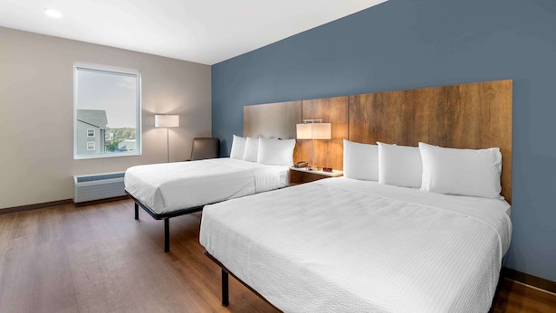 A hotel room with two beds, a large window, and a view of the outside. - Extended Stay America Premier Suites - Boise - Meridian (Meridian)