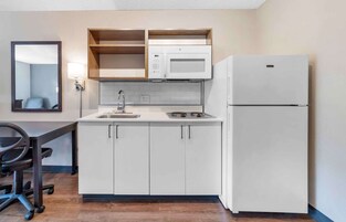 Individually furnished, desk, laptop workspace, iron/ironing board