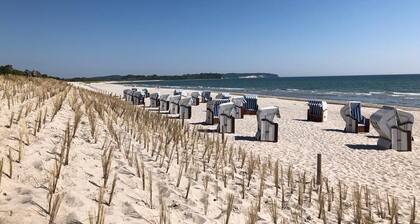 Fantastic thatched house on Rügen with water views and large garden