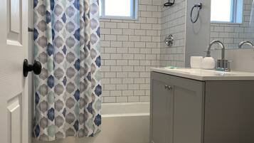 Hair dryer, towels, soap, toilet paper