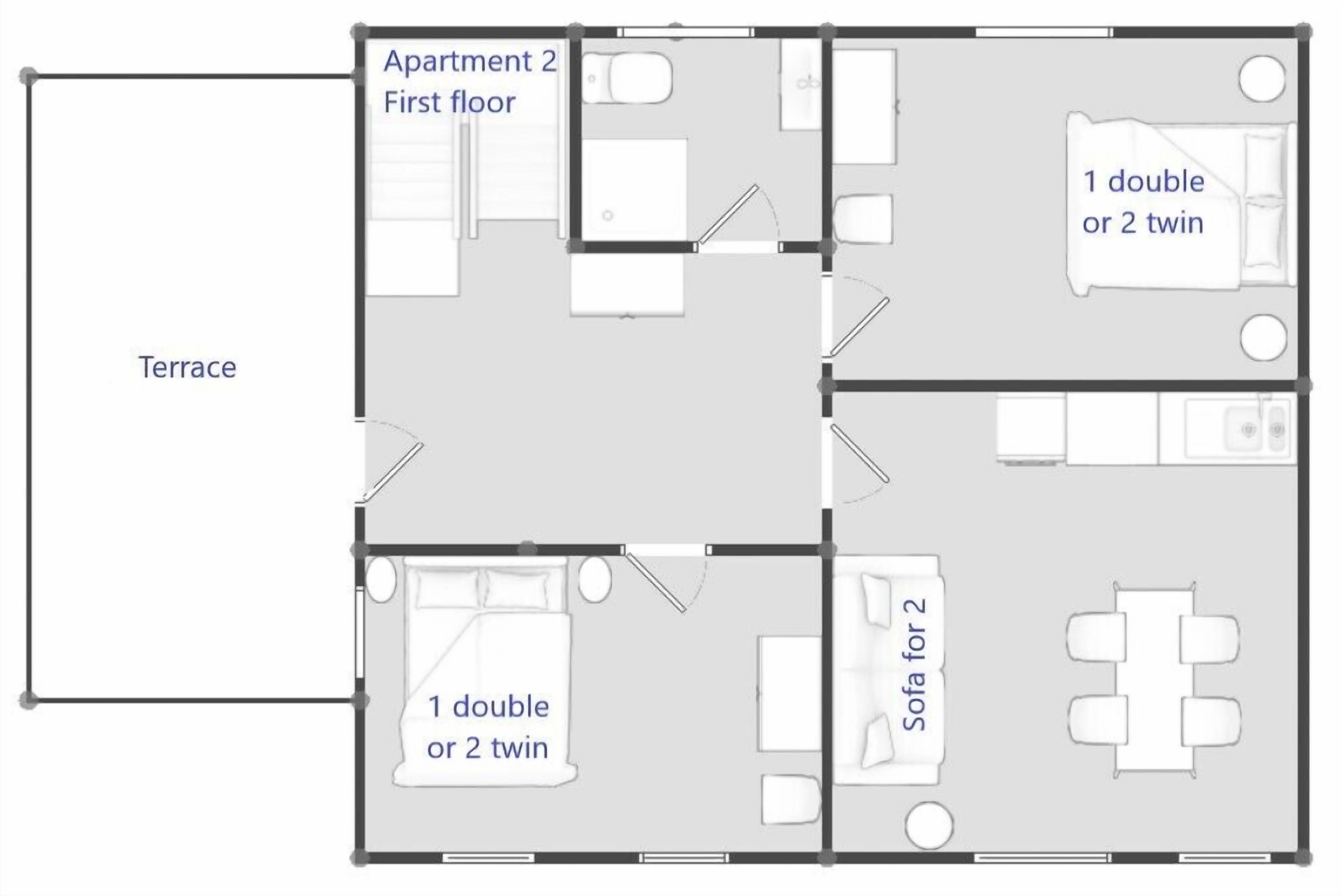 A floor plan of a hotel with two apartments on the first floor, each with a double bed or twin beds, a sofa set for two, and a small kitchen area.