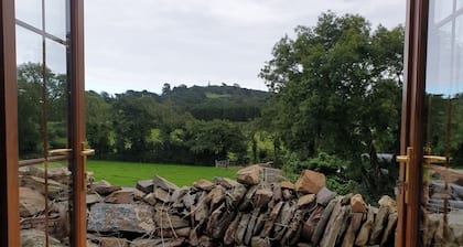 Traditional Irish cottage with views of Slieve Patrick