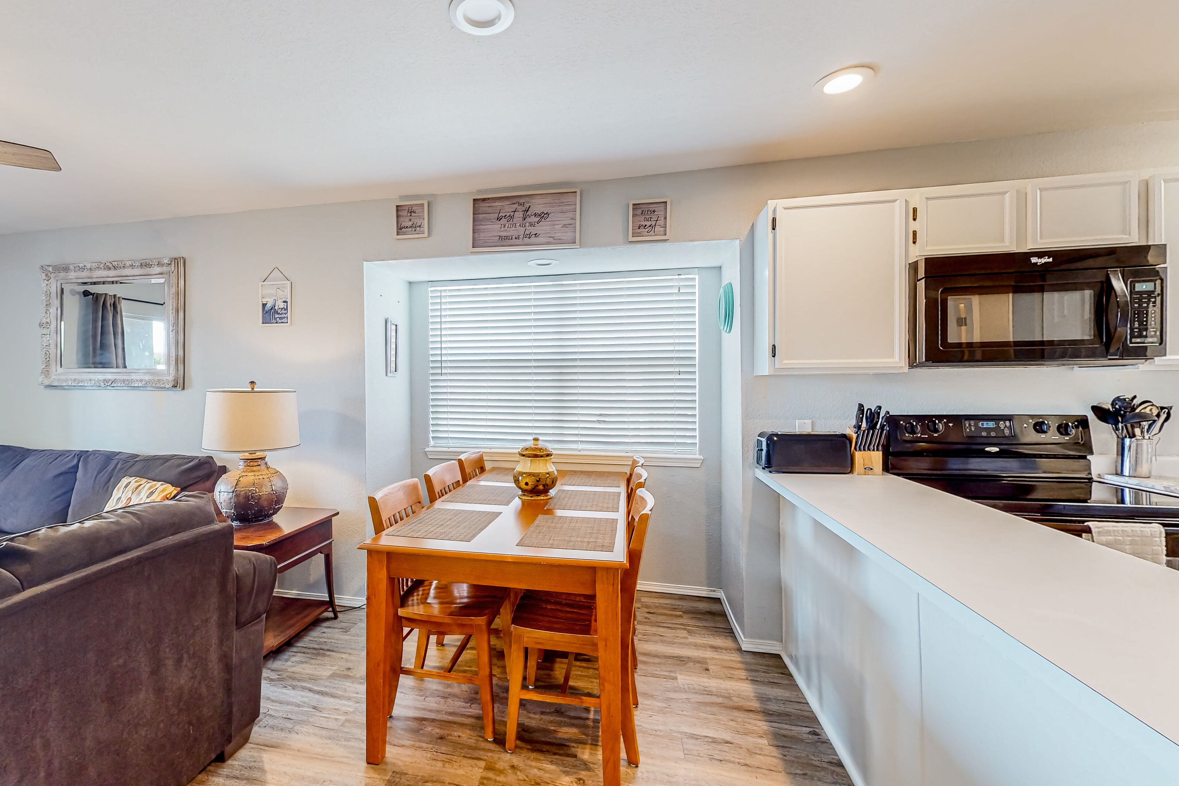 Lake view condo with pool, tennis, and basketball access - balcony, W/D, & AC