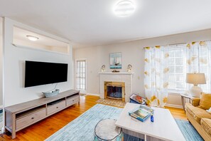 TV, fireplace, books - Spacious 2-story corporate rental duplex with large yard, 2 kitchens, fireplace (Colchester)