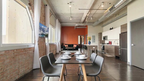 A modern kitchen with a dining area. - Skyline View 1BD | Sleeps 4 | Free Parking (Dallas)