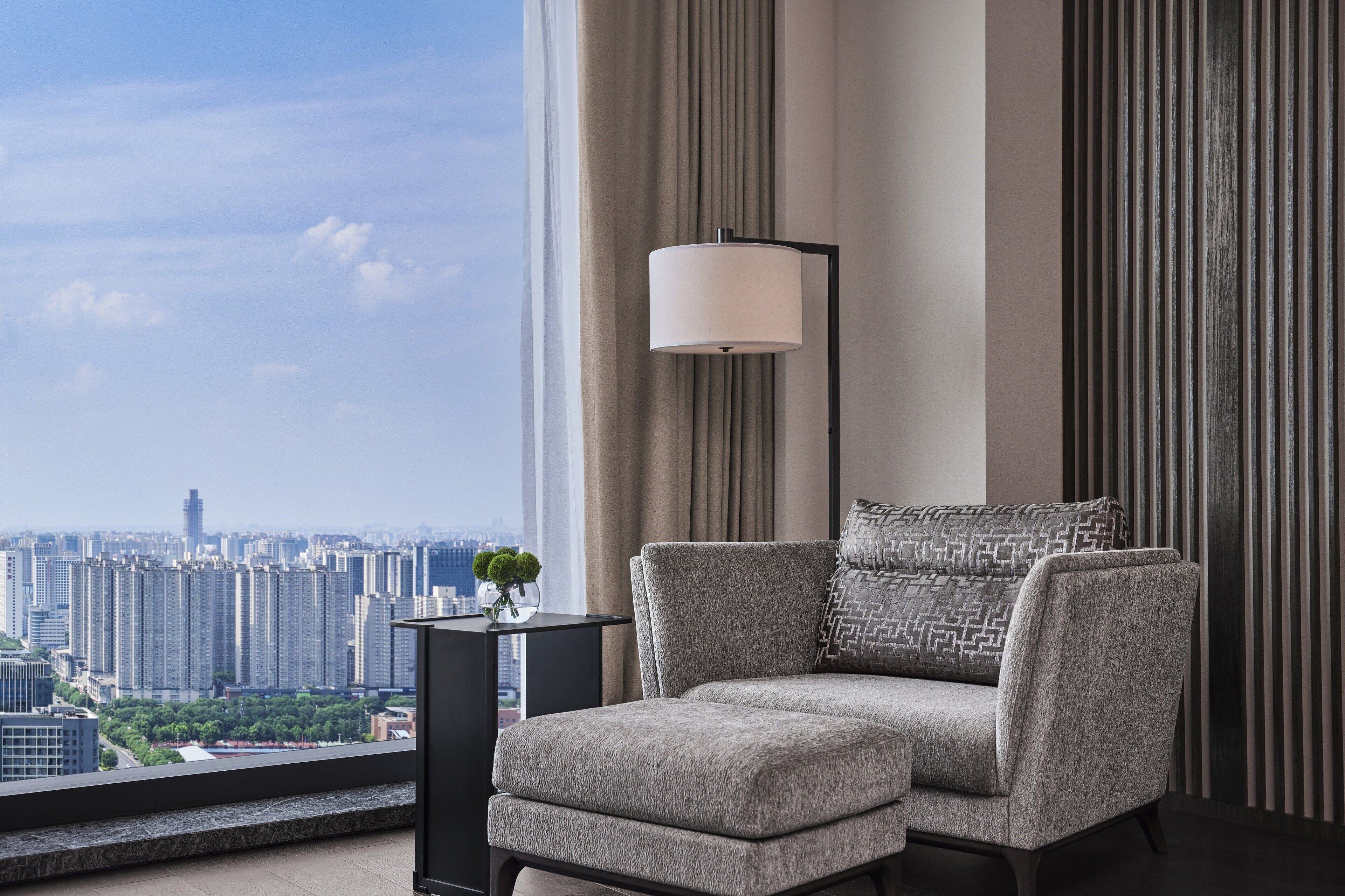 Deluxe Room, 1 King Bed, City View | Down comforters, minibar, in-room safe, individually decorated