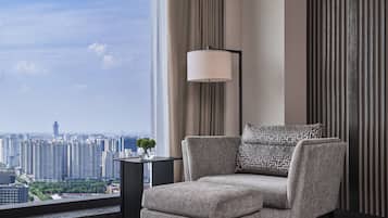 Deluxe Room, 1 King Bed, City View | Down comforters, minibar, in-room safe, individually decorated