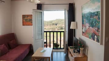 Apartment | Living area | 32-inch flat-screen TV with cable channels, TV