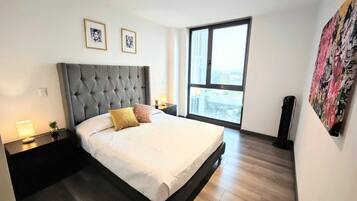 1 bedroom, desk, iron/ironing board, travel crib