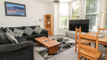 Appartamento, letti multipli | Area soggiorno