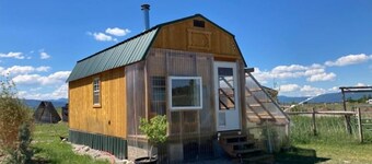 Tiny mountain house with country views