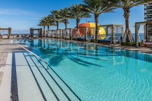 2 outdoor pools, open 7:30 AM to 6:30 PM, free cabanas, pool umbrellas