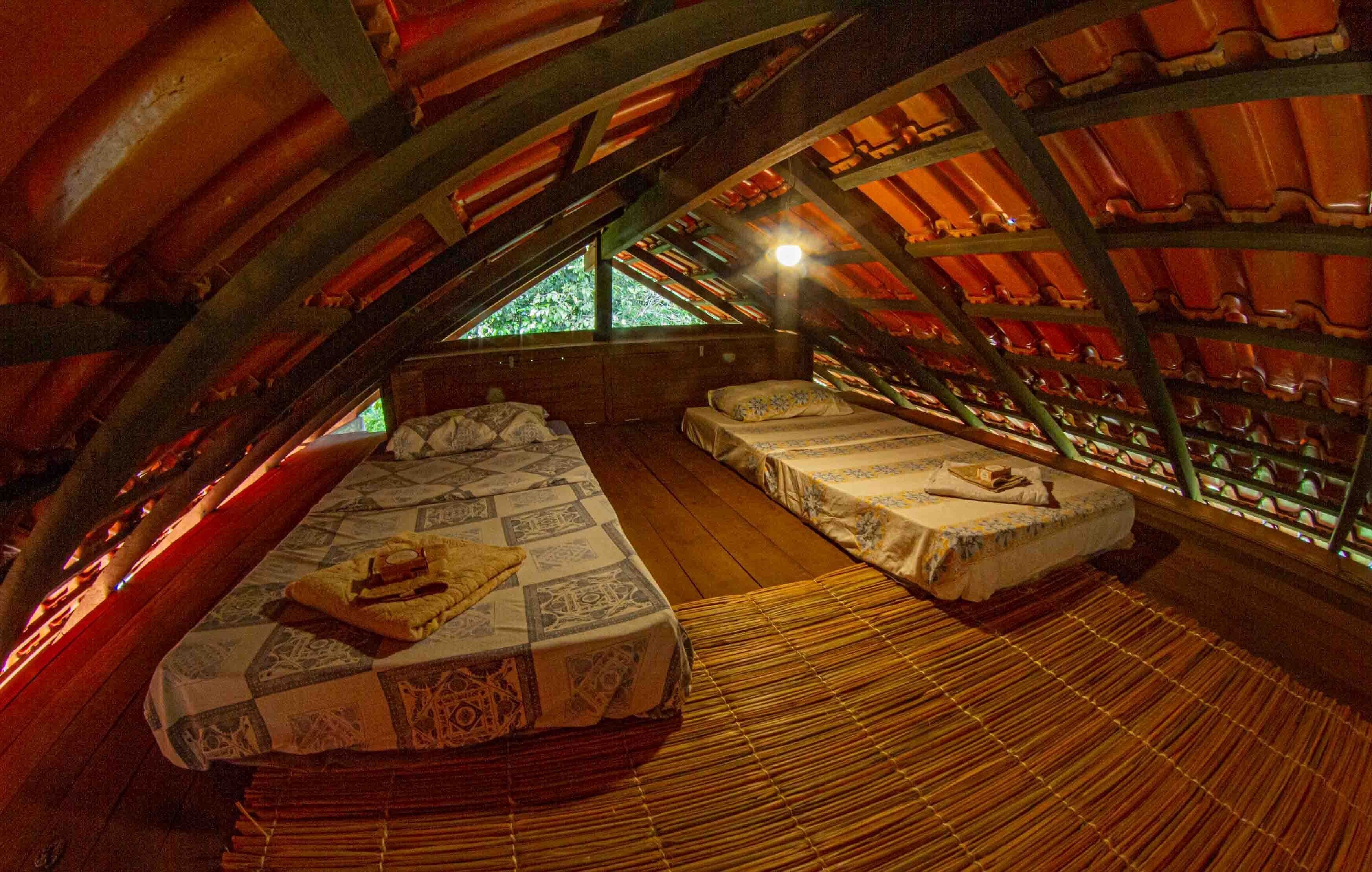 Rooms in house in forest near Igarapé