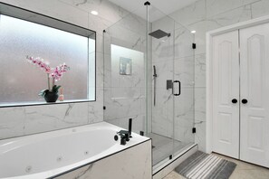 Shower, jetted tub, hair dryer, towels