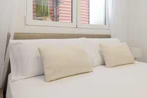 2 habitaciones, tabla de planchar con plancha y cuna de viaje 