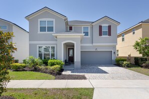 front facade of house with main entrance - Large resort style single family home with pool and hot tub, minutes from Disney (Four Corners)