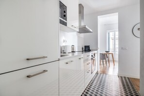 Fridge, microwave, oven, stovetop - Trendy Trafalgar 2BR, nr Plaza de Olavide, by Blueground (Madrid)