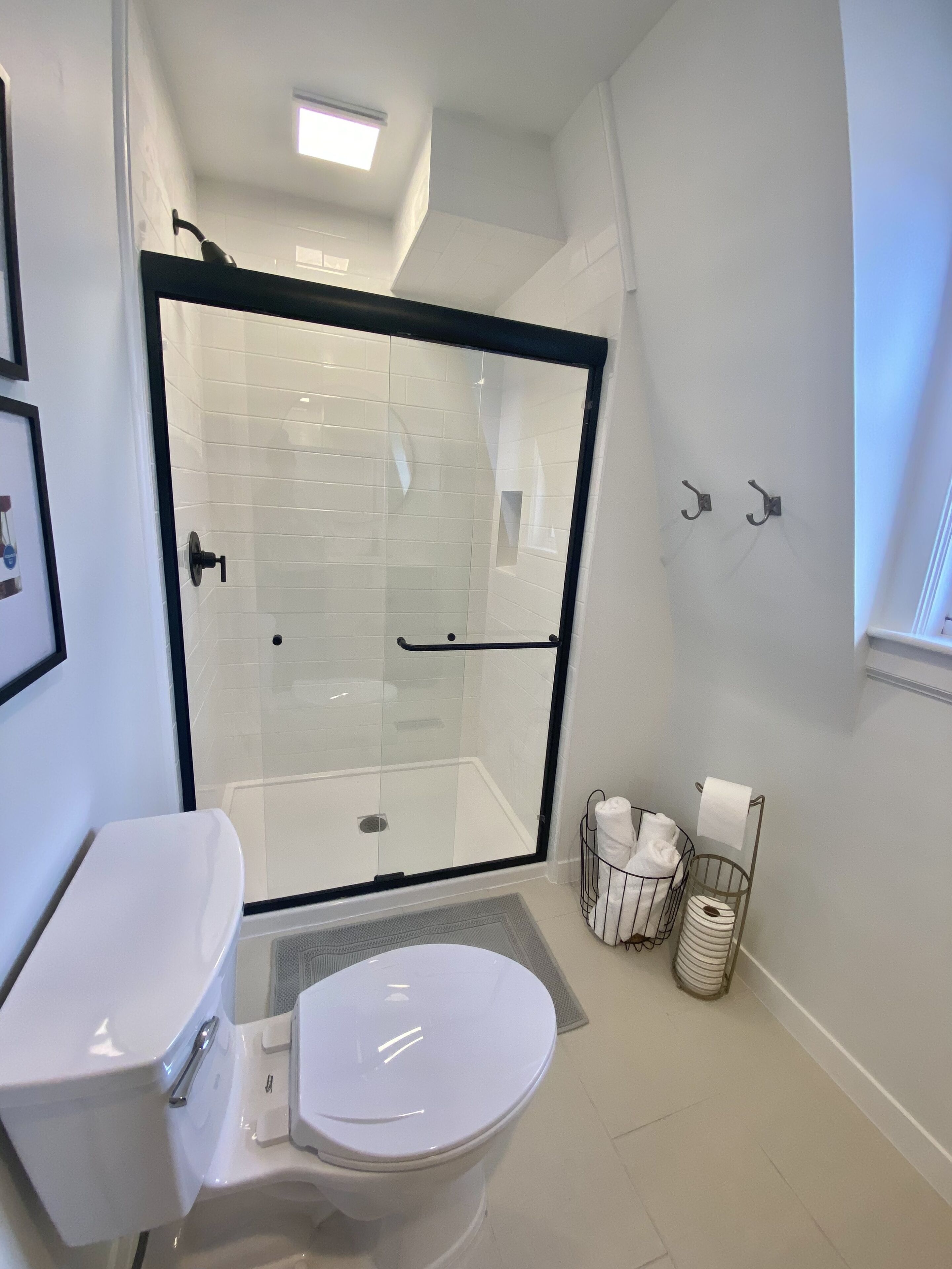 Shower, hair dryer, towels, soap