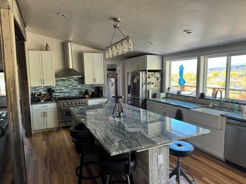 Beautiful River property with beach access. Relaxing deck-overlooking the valley