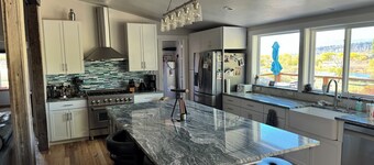 Beautiful River property with beach access. Relaxing deck-overlooking the valley