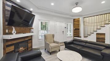 Smart TV, fireplace, books