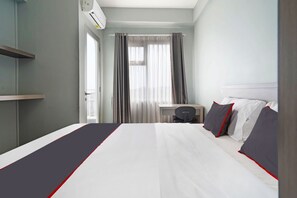 ห้องดีลักซ์ดับเบิล | โต๊ะทำงาน, พื้นที่ทำงานแบบใช้แล็ปท็อป, Wi-Fi ฟรี, ผ้าปูที่นอน
