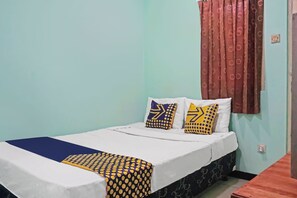 Economy Double Room | Laptop workspace, free WiFi, bed sheets - Hotel O Amazon Homestay Syariah 2 (Tjihadak)