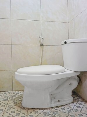 Regadera y toallas 