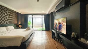 Suite Room | Cofres nos quartos, escrivaninha, cortinas blackout, Wi-Fi de cortesia