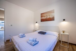 4 bedrooms, in-room safe, iron/ironing board, travel cot