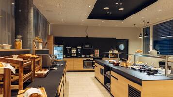 Petit déjeuner buffet (23 CHF par personne)