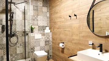 Shower, rainfall showerhead, hair dryer, towels