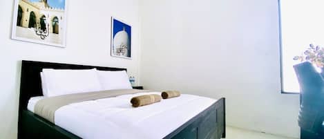 Pillowtop beds, desk, laptop workspace, free WiFi