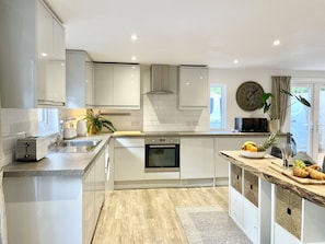 Fridge, dishwasher, electric kettle, cookware/dishes/utensils