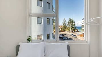 1 bedroom, laptop workspace, bed sheets