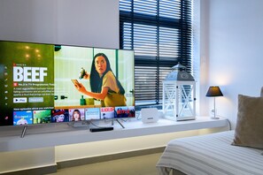 Deluxe Apartment | Living area | 55-inch Smart TV with digital channels, TV, Netflix - Flat with stunning views & prv parking (Glyfada)