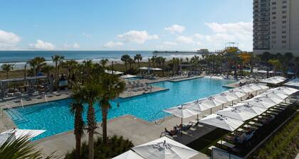 Steps to Atlantic Ocean and Currents Water Park located in a gated community.