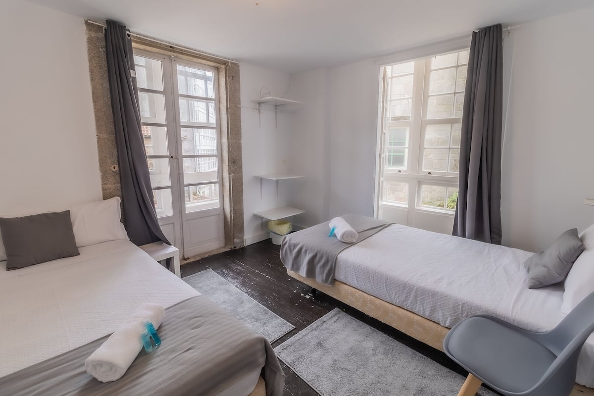 Desk, laptop workspace, free WiFi, bed sheets