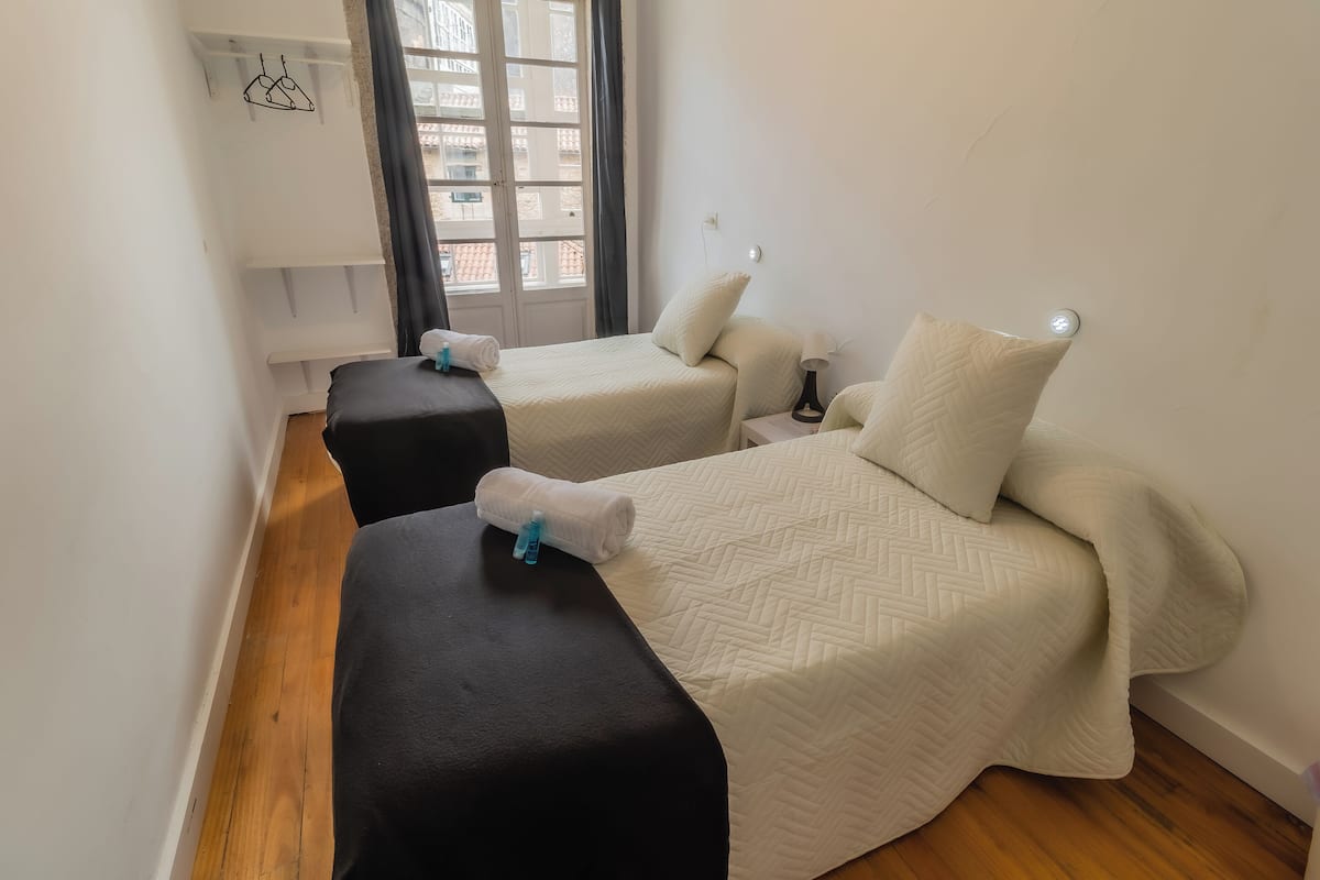 Desk, laptop workspace, free WiFi, bed sheets