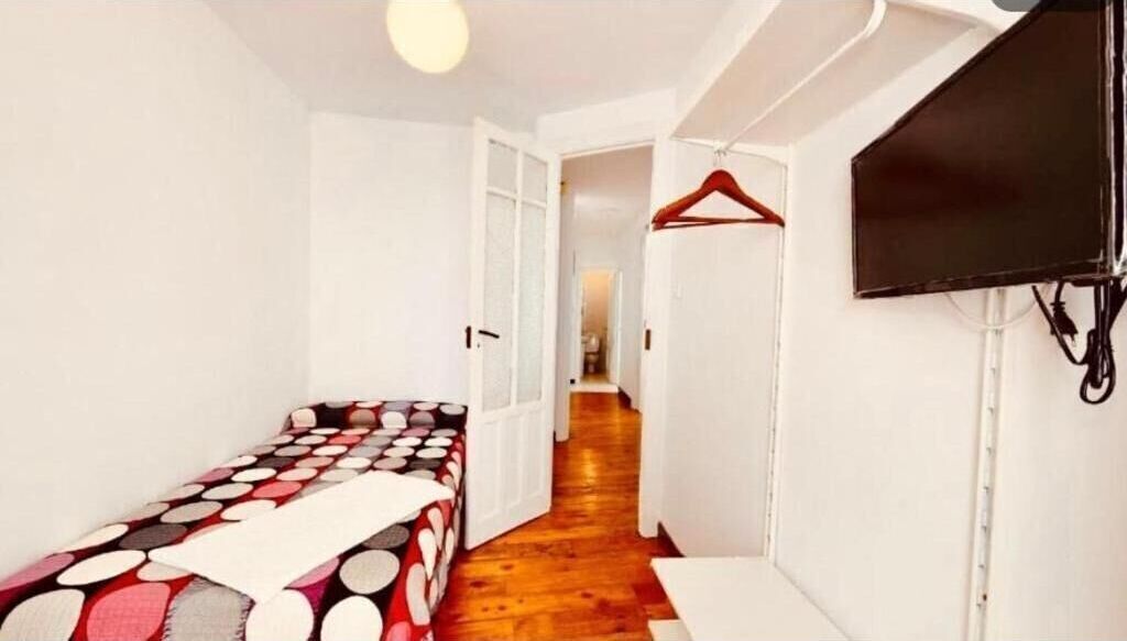 Desk, laptop workspace, free WiFi, bed sheets