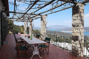 Outdoor dining - Hillside Villa overlooking Lemonodassos (Galatas)