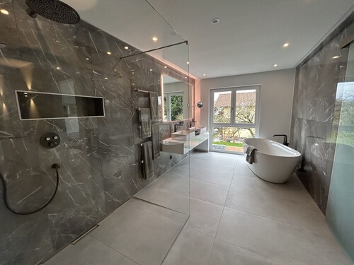 Luxurious holiday home with indoor and outdoor pool and sauna